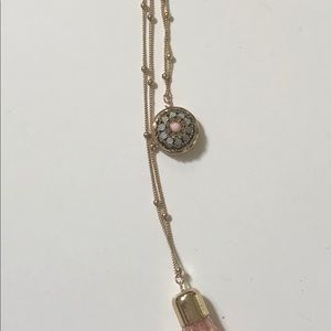 New long Y costume necklace, gold with pink tassel